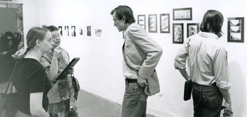 Joy Hakanson Colby interviewing Sam Wagstaff with Mapplethorpe at left in the background, Willis Gallery, Detroit, 1974. Photo: Brad Iverson